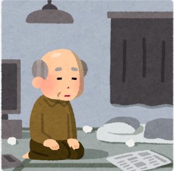 暗い部屋にいる老人